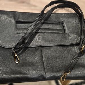 Elegant Black Clutch with Gold Accents